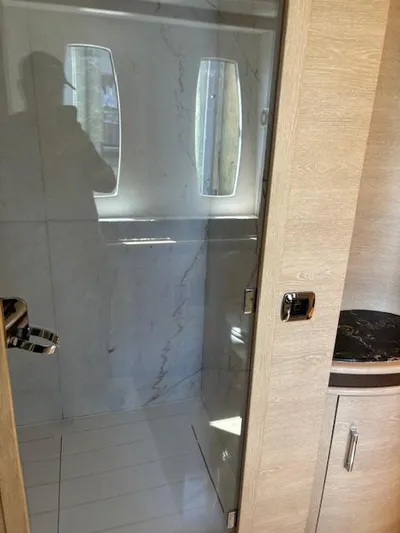  Yacht Photos Pics Bathroom interior of 2009 Astondoa 96 GLX yacht with glass shower door.