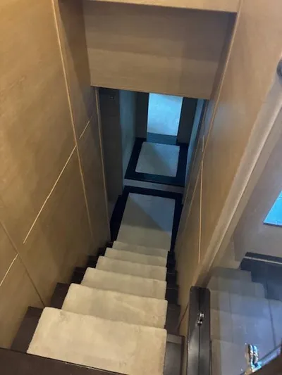  Yacht Photos Pics Staircase inside 2009 Astondoa 96 GLX yacht, featuring modern wooden design.