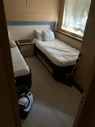  Yacht Photos Pics Interior cabin of 2009 Astondoa 96 GLX yacht with twin beds and window.