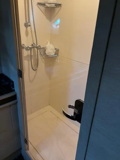  Yacht Photos Pics Shower area in 2009 Astondoa 96 GLX yacht, featuring modern fixtures and storage shelves.