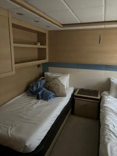 Yacht Photos Pics Interior cabin of 2009 Astondoa 96 GLX yacht with twin beds and wooden decor.