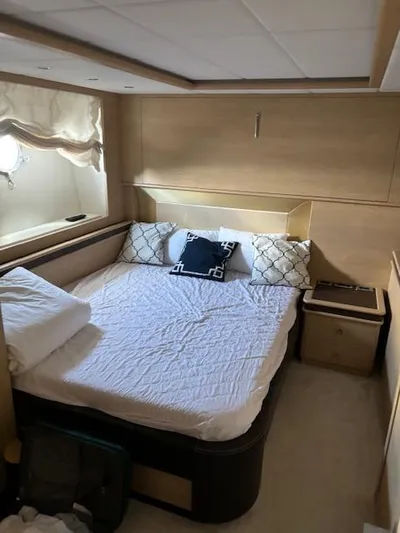  Yacht Photos Pics Luxurious bedroom in 2009 Astondoa 96 GLX yacht with elegant bedding and natural light.