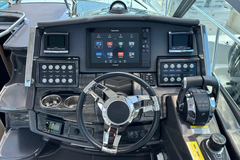  Yacht Photos Pics Cockpit of 2017 Monterey 355 Sport Yacht with advanced navigation controls and touchscreen display.