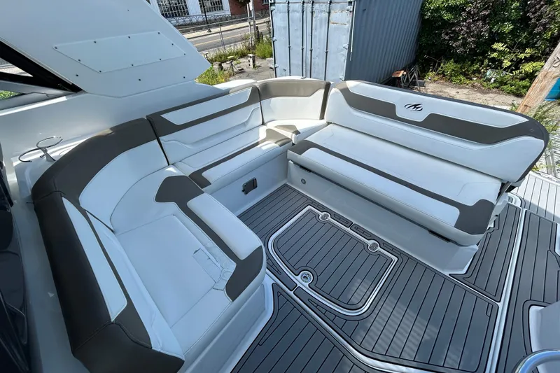  Yacht Photos Pics 2017 Monterey 355 Sport Yacht interior with sleek, modern seating and stylish flooring.