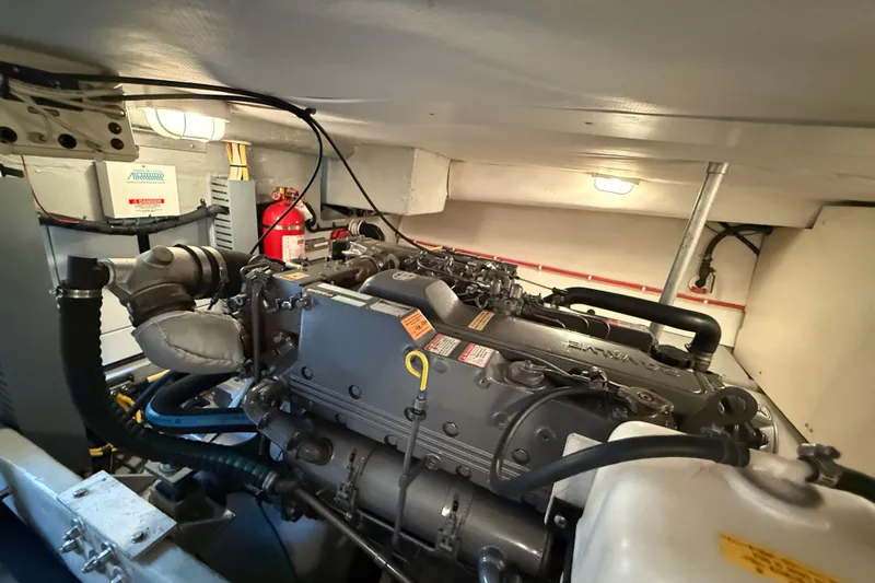  Yacht Photos Pics Engine room of 2006 Mainship 34 Trawler with visible machinery and equipment.