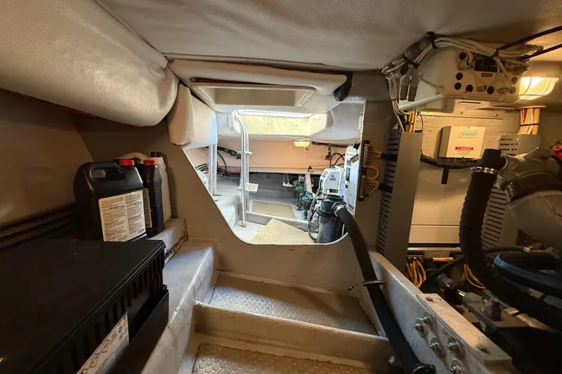  Yacht Photos Pics Engine room of 2006 Mainship 34 Trawler, showcasing equipment and maintenance area.