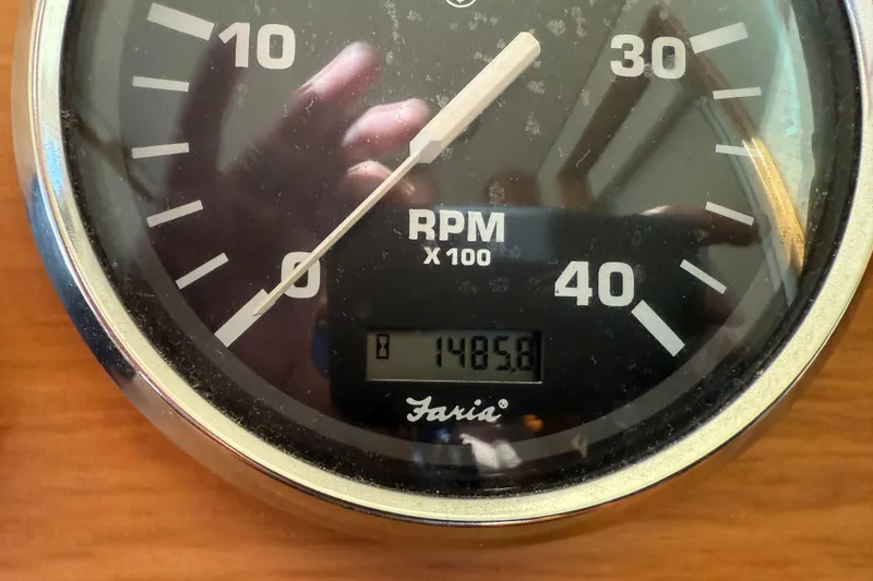  Yacht Photos Pics Close-up of a Faria tachometer showing 1485.8 RPM on a 2006 Mainship 34 Trawler.