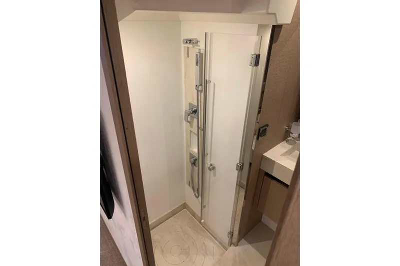 Fly Away Yacht Photos Pics Compact shower area in a 2018 Prestige 520 yacht bathroom.