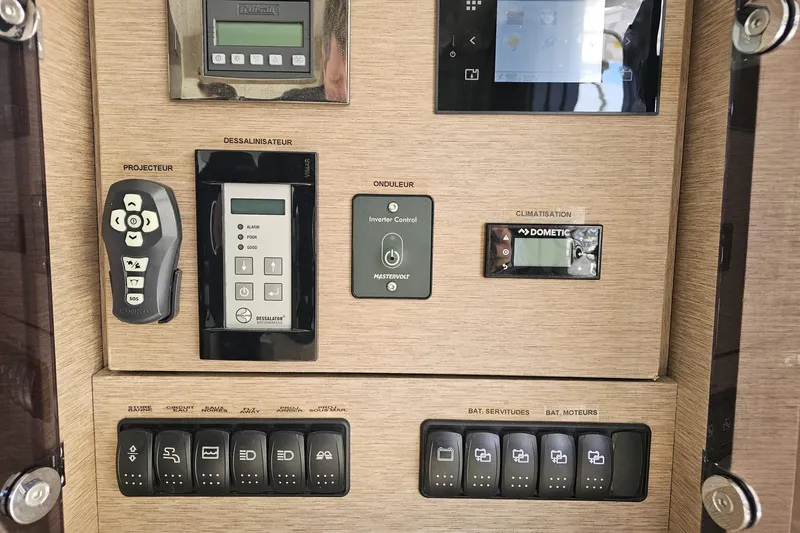 Fly Away Yacht Photos Pics Control panel of a 2018 Prestige 520 yacht with various switches and displays.