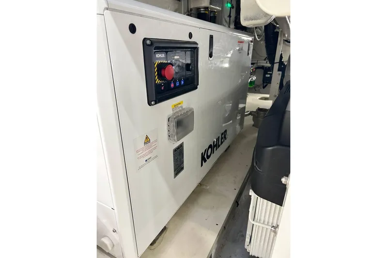  Yacht Photos Pics Kohler generator in 2023 Cranchi Sessantasette 67 yacht engine room.