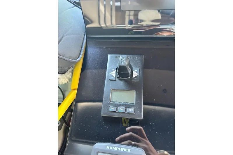  Yacht Photos Pics Control panel on 2023 Cranchi Sessantasette 67 yacht, featuring digital display and switches.