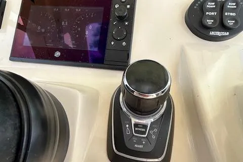 Seas Today Yacht Photos Pics 2019 Scout 355 LXF boat control panel with joystick and display screen.