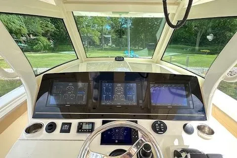 Seas Today Yacht Photos Pics 2019 Scout 355 LXF boat dashboard with advanced navigation displays and controls.