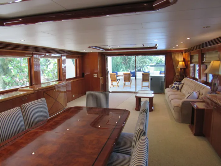 Sanctuary Yacht Photos Pics Luxurious interior of 2002 Hargrave Raised Pilothouse yacht with elegant dining and seating areas.