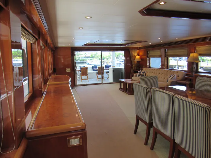 Sanctuary Yacht Photos Pics Luxurious interior of 2002 Hargrave Raised Pilothouse yacht with elegant dining and seating area.
