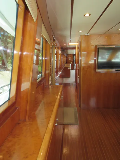 Sanctuary Yacht Photos Pics Luxurious interior of 2002 Hargrave Raised Pilothouse yacht with polished wood finishes.