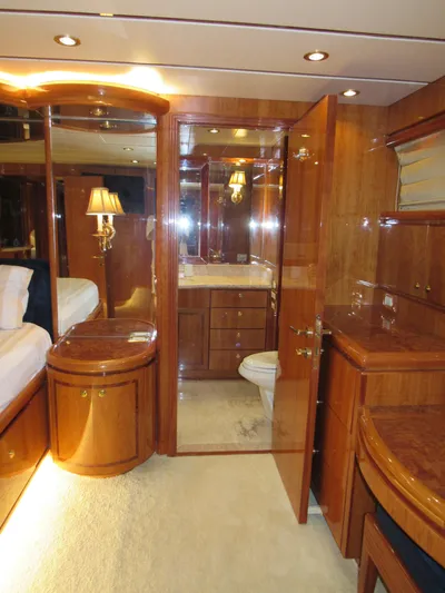 Sanctuary Yacht Photos Pics Luxurious 2002 Hargrave Raised Pilothouse yacht interior with elegant wood finishes and cozy lighting.