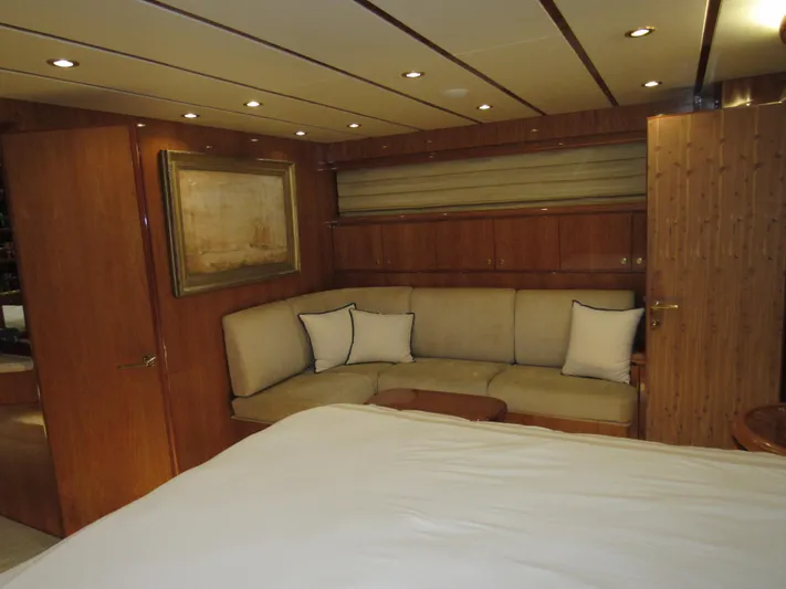 Sanctuary Yacht Photos Pics Luxurious 2002 Hargrave Raised Pilothouse interior with cozy seating and elegant wood paneling.