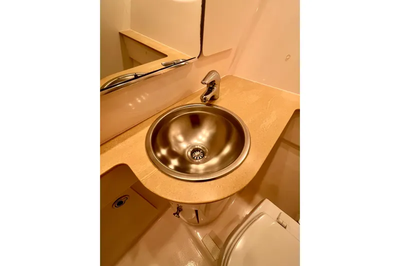 Blue Pearl Yacht Photos Pics 2005 Tiara Yachts 3200 Open bathroom sink with modern stainless steel design.