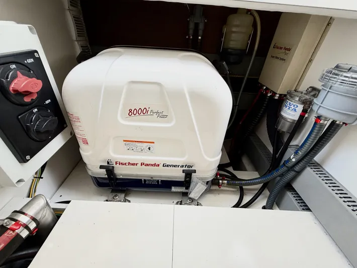 Remotely Workin' Yacht Photos Pics Fischer Panda generator in 2022 Jeanneau NC 1095 Coupe engine compartment.