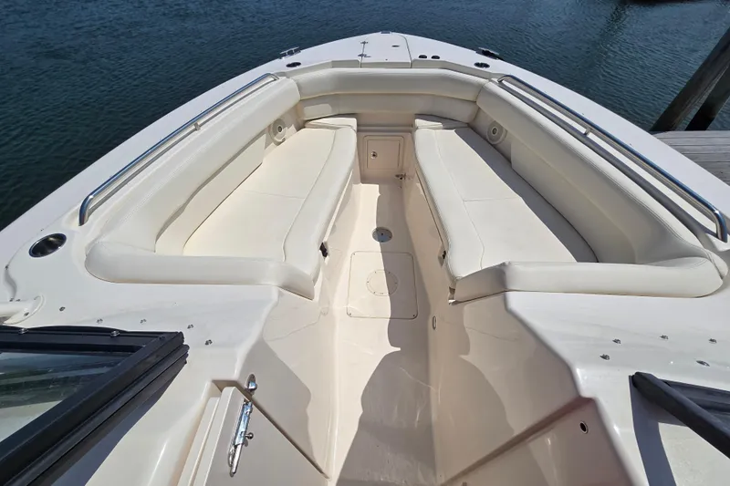  Yacht Photos Pics 2016 Grady-White Freedom 307 boat interior with spacious seating and sleek design.