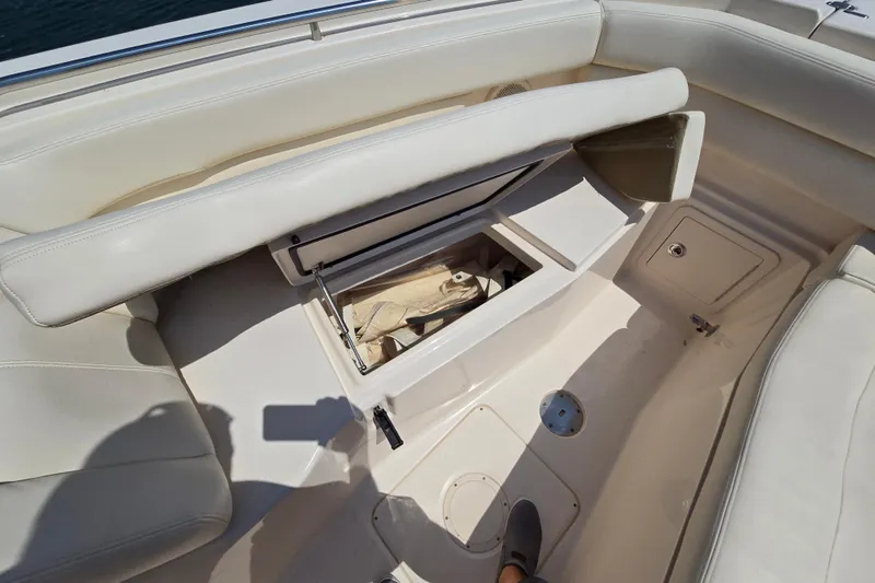  Yacht Photos Pics 2016 Grady-White Freedom 307 boat interior with open storage compartment.