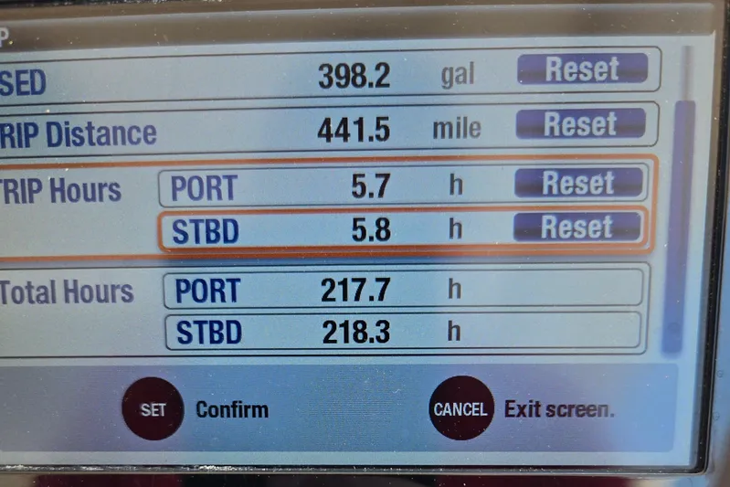  Yacht Photos Pics Display screen of a 2016 Grady-White Freedom 307 boat showing trip data and engine hours.