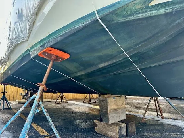  Yacht Photos Pics 2019 Beneteau Antares 27 boat hull on stands for maintenance.