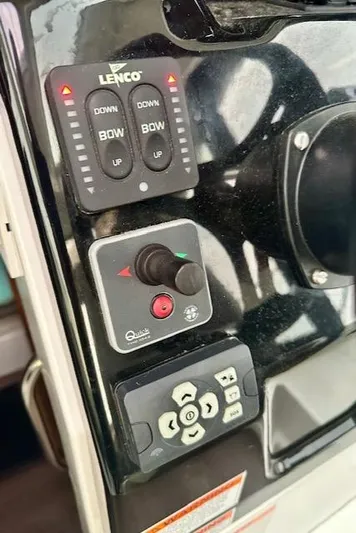  Yacht Photos Pics Control panel of a 2019 Beneteau Antares 27 boat with Lenco trim tabs.