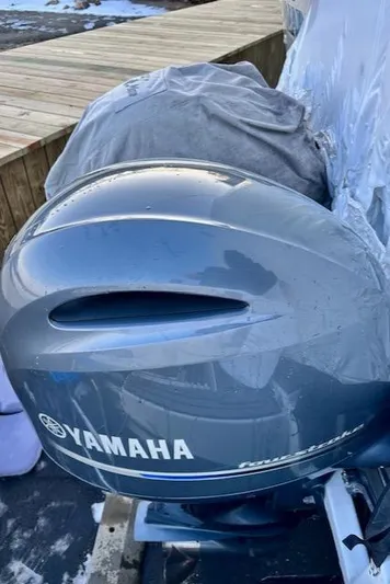  Yacht Photos Pics Yamaha outboard motor on a 2019 Beneteau Antares 27 boat, dockside view.