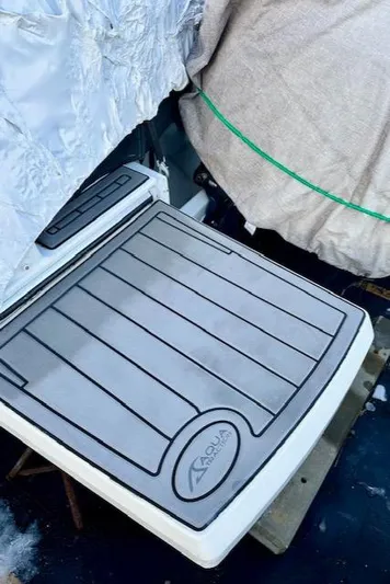  Yacht Photos Pics 2019 Beneteau Antares 27 boat deck with protective covering.