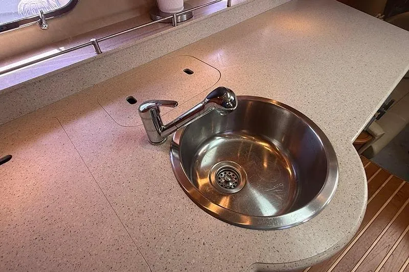 Ritz Karllton Too Yacht Photos Pics 2008 Tiara Yachts 3900 Sovran kitchen sink with modern faucet and countertop.