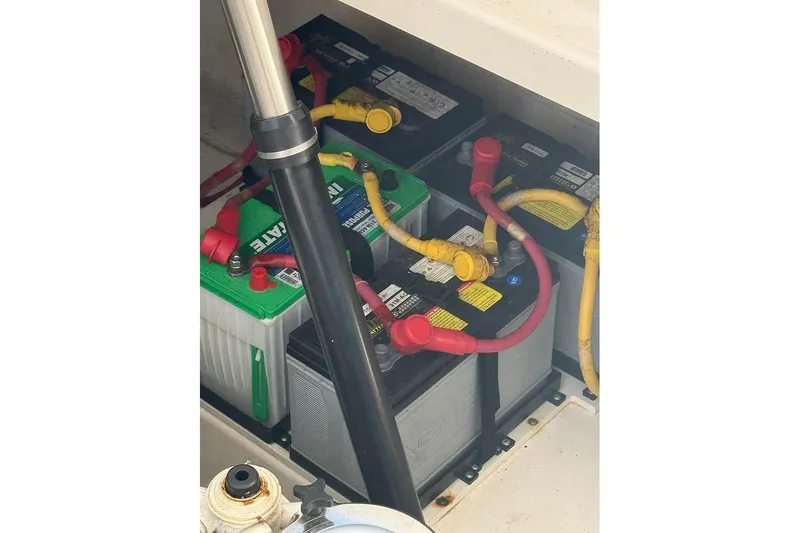 Ritz Karllton Too Yacht Photos Pics Battery compartment of a 2008 Tiara Yachts 3900 Sovran with connected cables.