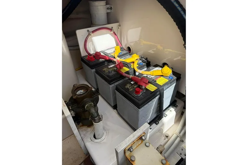 Ritz Karllton Too Yacht Photos Pics Battery compartment of 2008 Tiara Yachts 3900 Sovran, featuring multiple batteries and wiring.