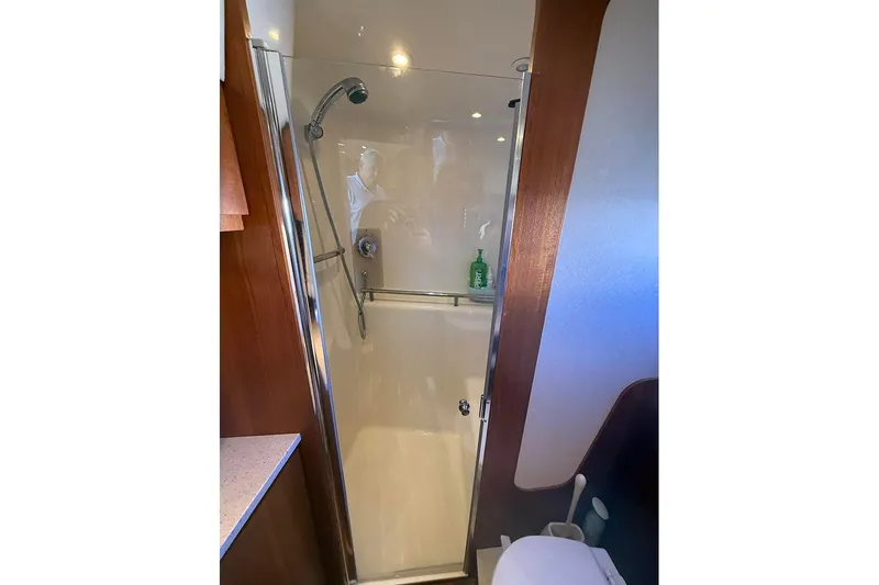 Ritz Karllton Too Yacht Photos Pics 2008 Tiara Yachts 3900 Sovran bathroom with shower and modern fixtures.