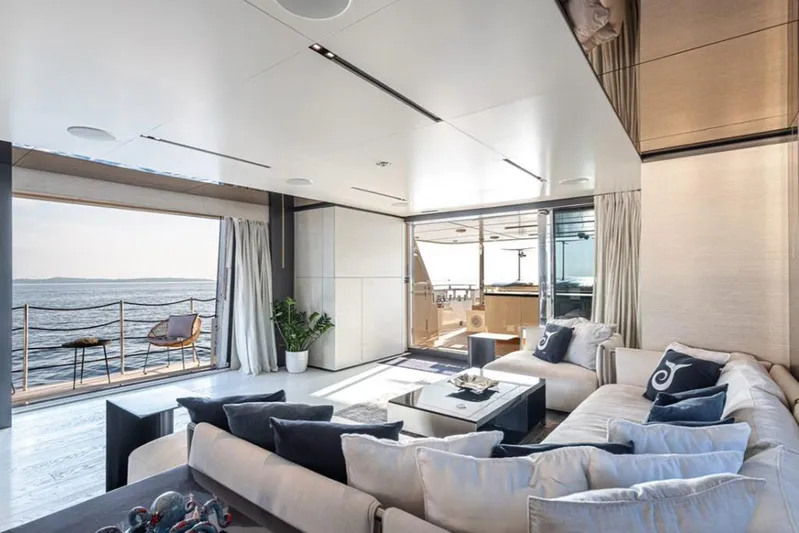 Newal Yacht Photos Pics Luxurious interior of 2018 Custom Line Navetta 33 yacht with ocean view and elegant decor.