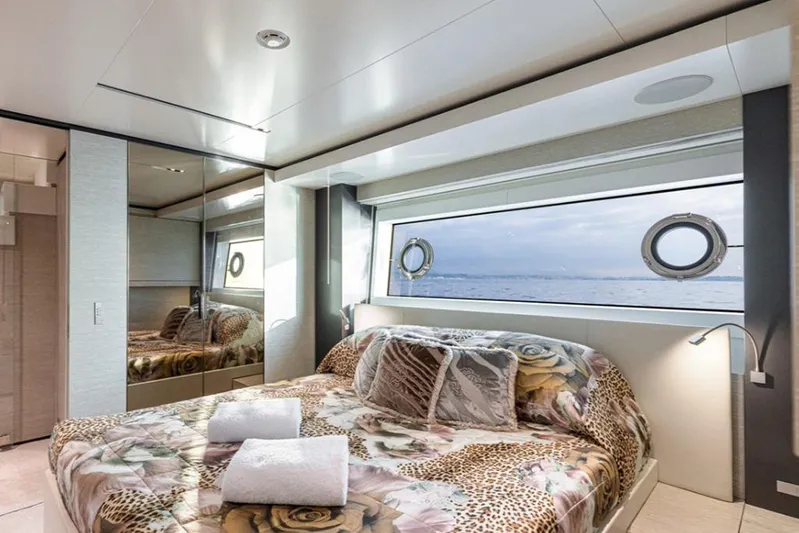 Newal Yacht Photos Pics Luxurious bedroom interior on 2018 Custom Line Navetta 33 yacht with ocean view.