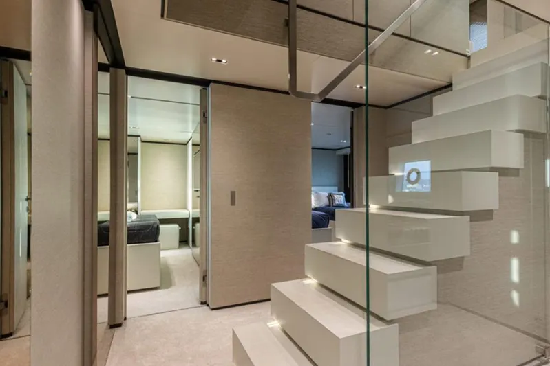 Newal Yacht Photos Pics Luxurious interior of 2018 Custom Line Navetta 33 yacht with modern staircase and elegant design.