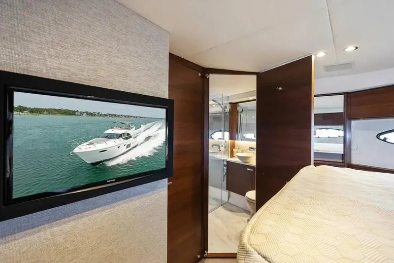  Yacht Photos Pics Luxurious 2018 Princess F49 yacht interior with TV and modern bathroom.