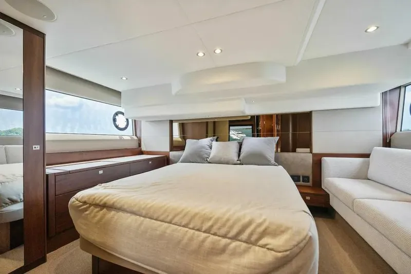  Yacht Photos Pics Luxurious interior of 2018 Princess F49 yacht with elegant bedroom design.