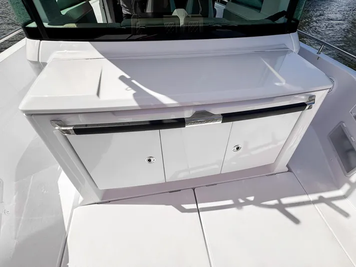  Yacht Photos Pics 2024 Axopar 37XC CROSS CABIN BRABUS Trim, sleek white exterior detail.