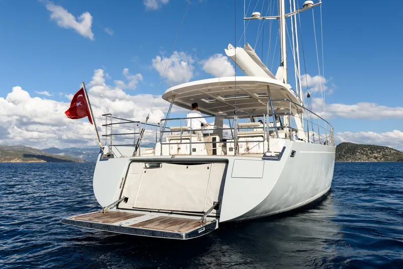 Mishi Yacht Photos Pics Luxury yacht "Mishi 88" sailing on open sea, 2018 model, with clear blue skies.