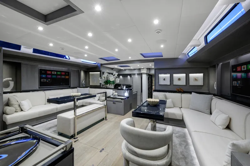 Mishi Yacht Photos Pics Luxurious interior of 2018 Custom Mishi 88 yacht with modern furnishings and ambient lighting.