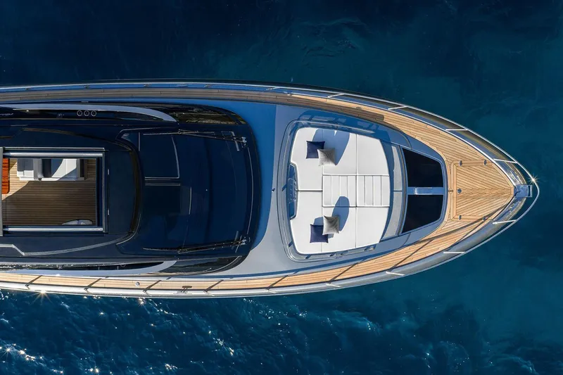  Yacht Photos Pics Manufacturer Provided Image: Top view of 2026 Riva 58' Capri yacht on blue water.