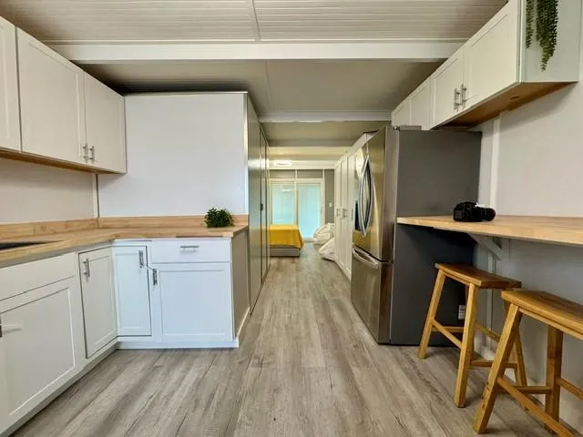  Yacht Photos Pics Modern Struktures MS 400 kitchen, 2023 model, featuring sleek cabinetry and stainless steel appliances.