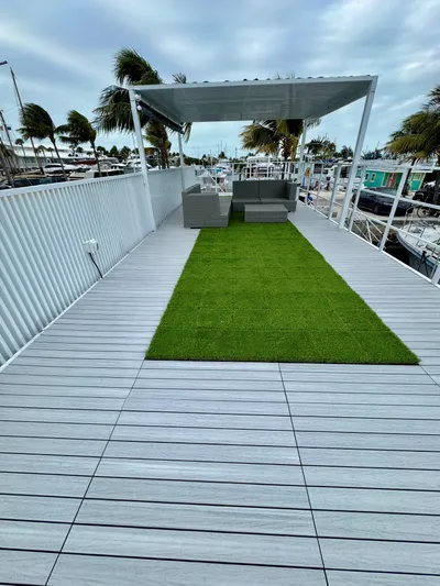  Yacht Photos Pics Modern Struktures MS 400 rooftop deck with artificial grass and seating area, 2023 model.