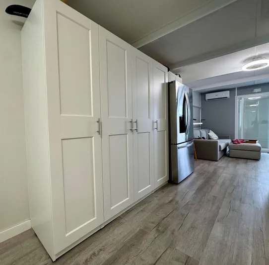  Yacht Photos Pics Modern kitchen with white cabinets, stainless steel fridge, and sleek flooring, 2023 Modern Struktures MS 400.