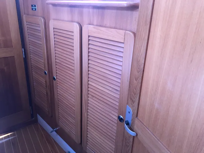 Snug Harbor Yacht Photos Pics Fwd stateroom  storage