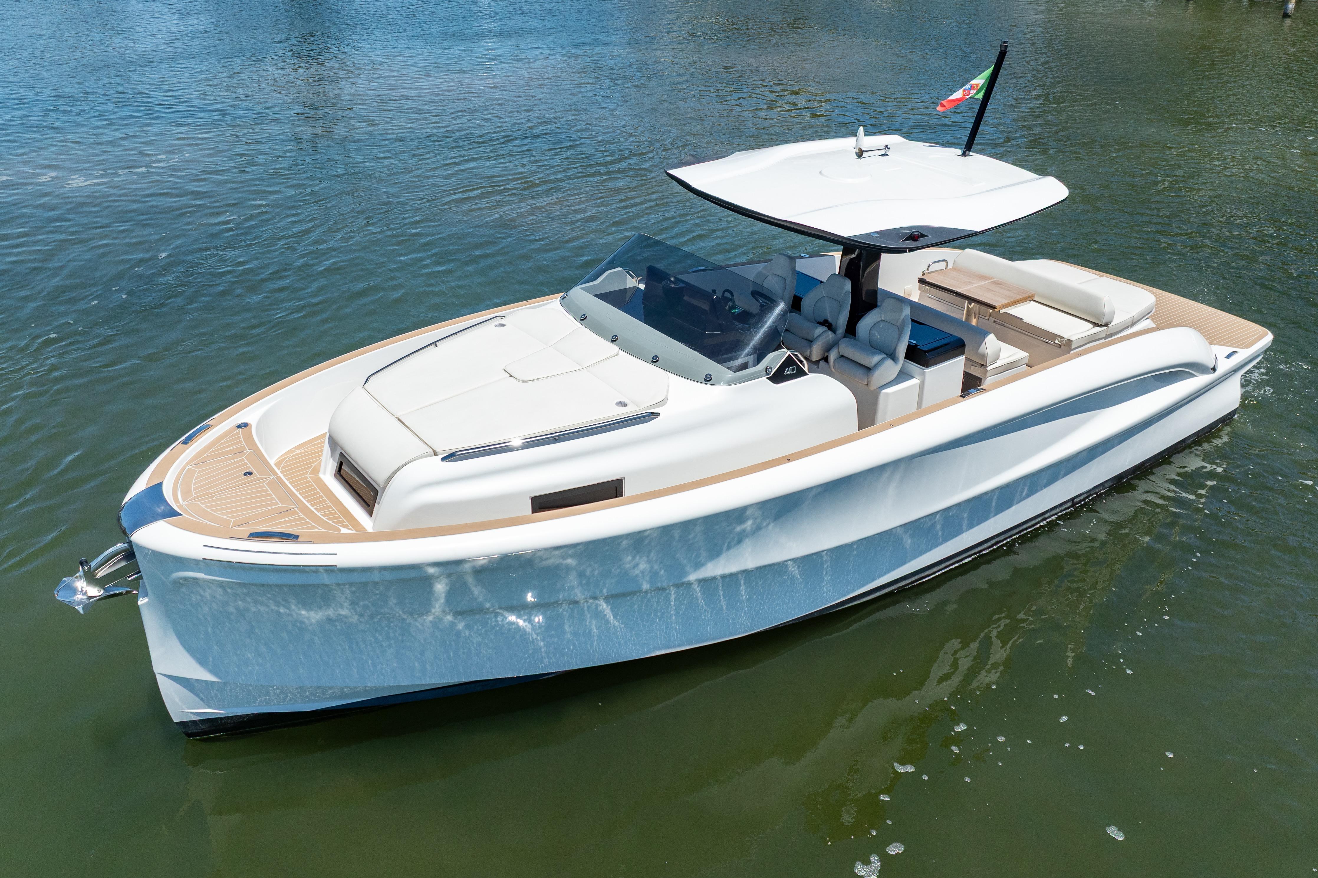 2027 Solaris Power 40 Open yacht on calm water, showcasing sleek design and luxury features.