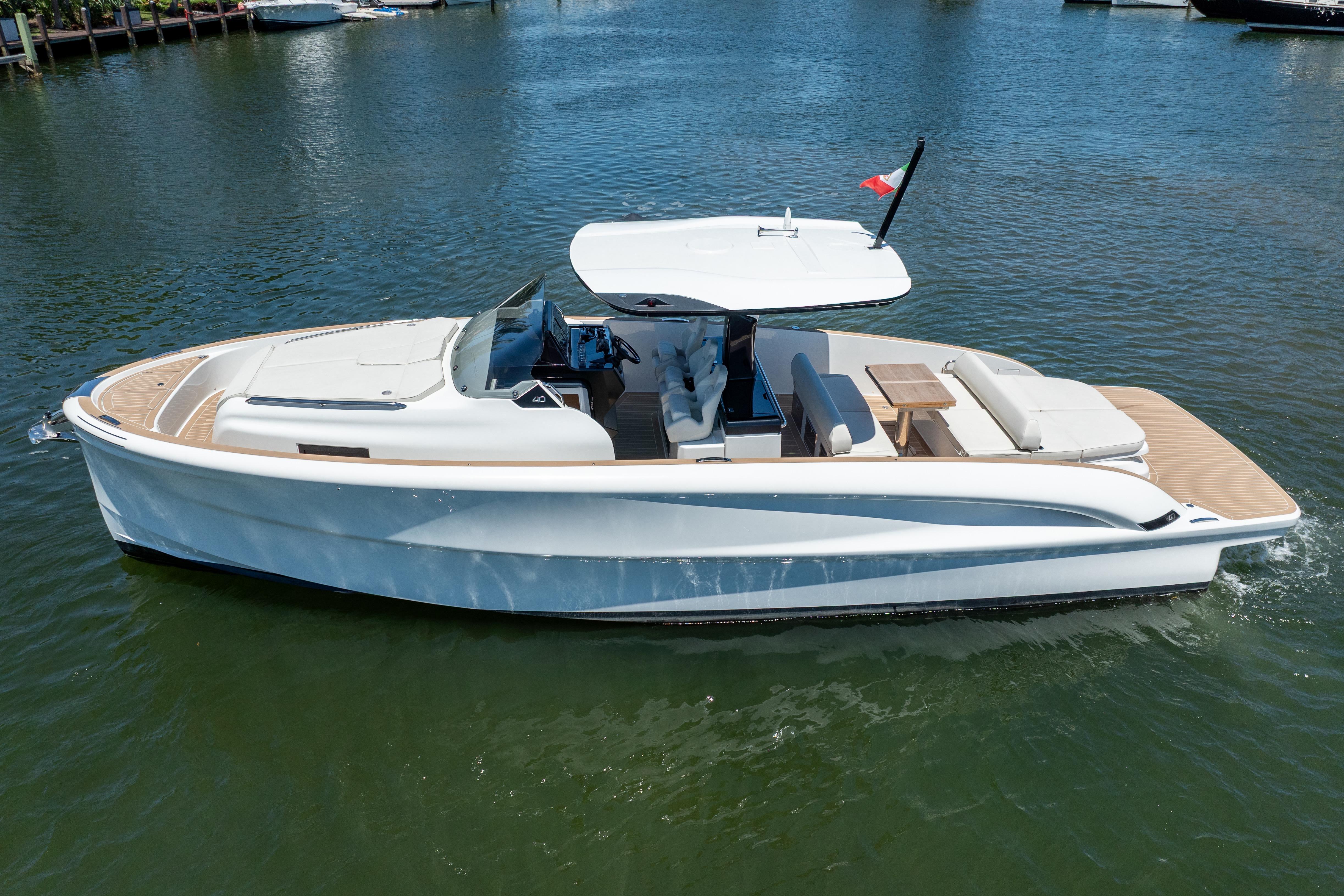 2027 Solaris Power 40 Open yacht cruising on calm water, featuring sleek design and spacious deck.